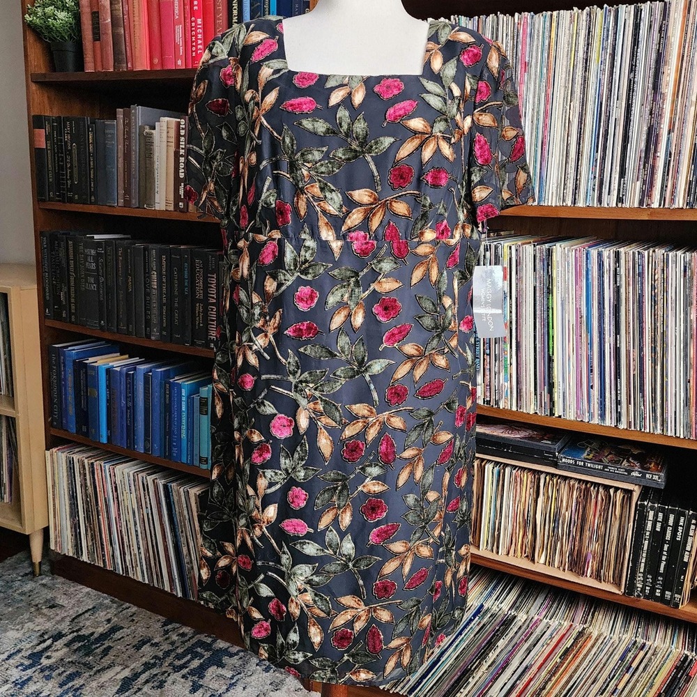 18WP black square neck dress with velvet leaves in red, orange, and green
